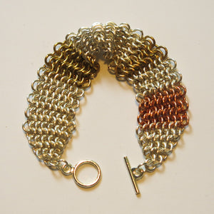 Chain Maille Bracelet in Slinky European 4-in-1 Weave, gold, silver and copper, with gold toggle clasp