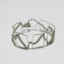 Load image into Gallery viewer, Silver hand-shaped wire bracelet with matching beads