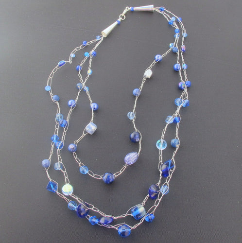 Products Multi-Strand, Crocheted Wire or Cord Necklace with Silver Cones and Blue Beads