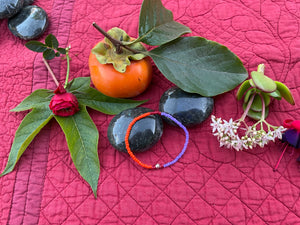 Lilac and orange stretchy bracelet