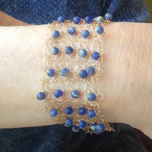 Load image into Gallery viewer, Hand-Crocheted Wire Bracelet with Semi-Precious Lapis Lazuli Gemstone Beads with gold wire &amp; slide lock clasp