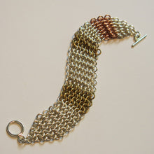 Load image into Gallery viewer, Chain Maille Bracelet in Slinky European 4-in-1 Weave, gold, silver and copper, with gold toggle clasp