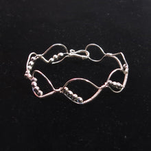 Load image into Gallery viewer, Silver hand-shaped wire bracelet with matching beads