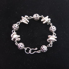 Load image into Gallery viewer, Silver_Overlay_and_Pewter_Orbit_Bracelet_with_handmade_clasp
