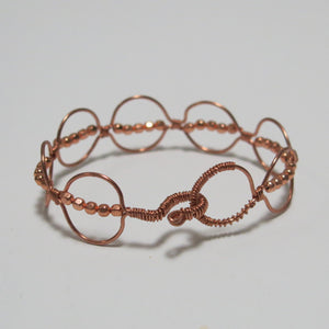 Hand-shaped Copper wire bracelet with matching beads