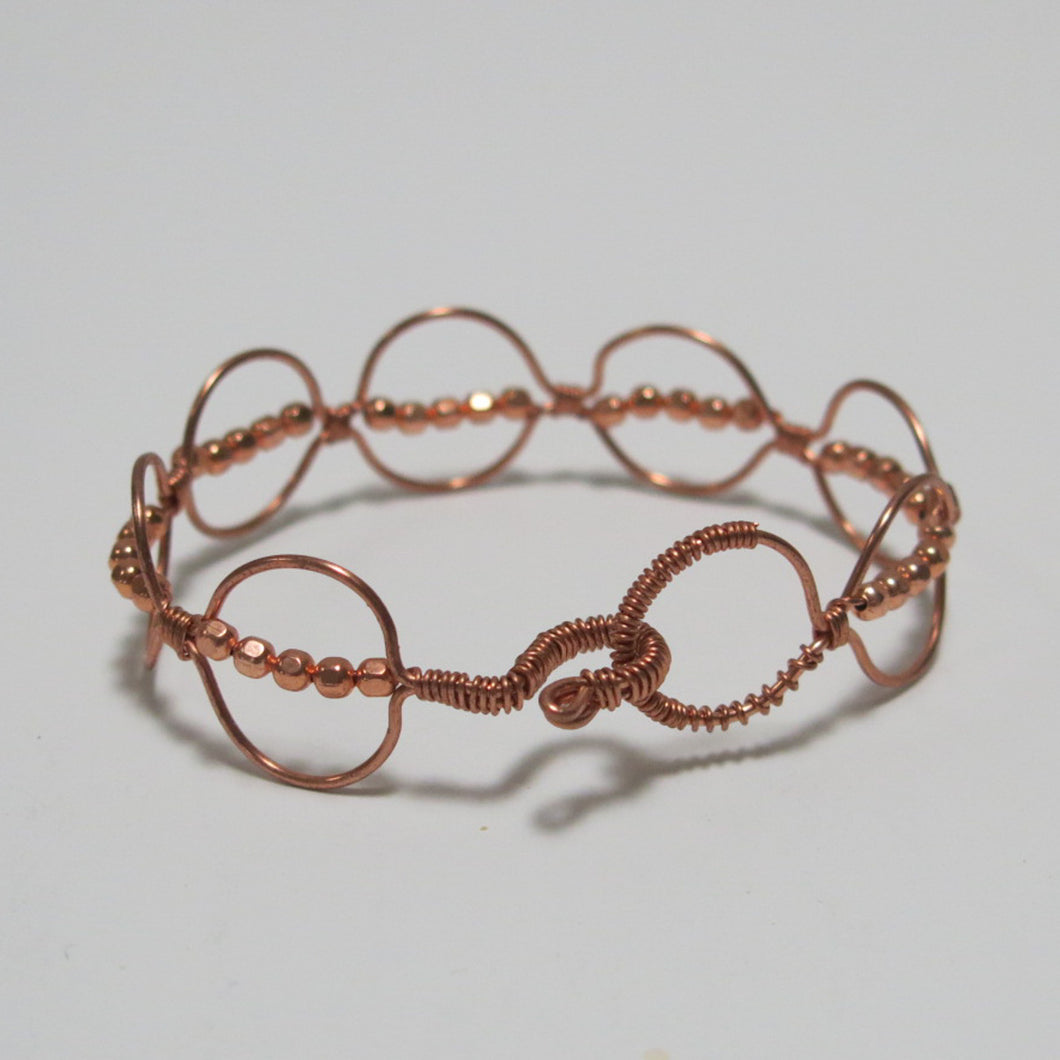 Hand-shaped Copper wire bracelet with matching beads