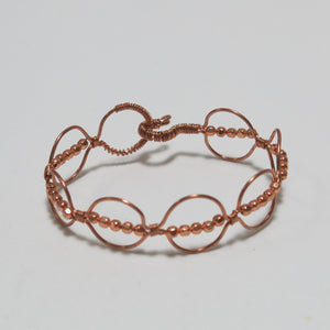 Hand-shaped Copper wire bracelet with matching beads