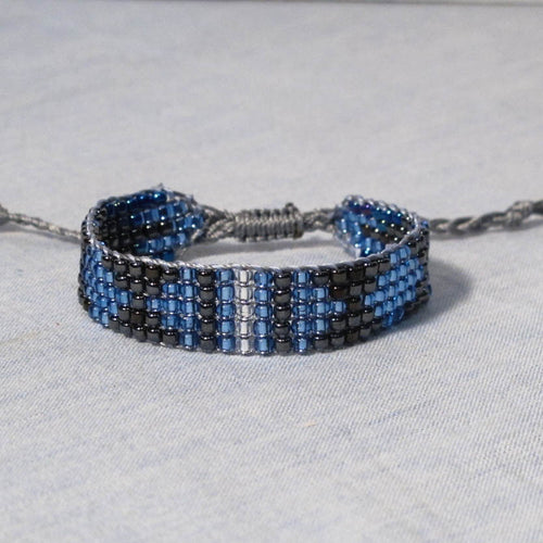 Blue, Black, Grey, White Bead Woven Bracelet with adjustable sliding macrame closure