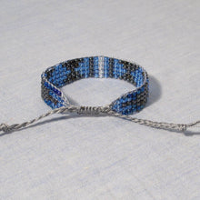 Load image into Gallery viewer, Blue, Black, Grey, White Bead Woven Bracelet with adjustable sliding macrame closure