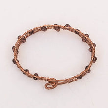 Load image into Gallery viewer, Copper hand-shaped wire bracelet with crystal beads