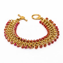 Load image into Gallery viewer, Gold Chain Maille Bracelet - European 4-in-1 Weave with Irridescent Fuschia Seed Beads and decorative gold toggle clasp