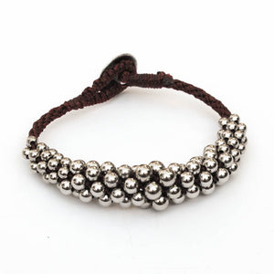 Black and Silver Kumihimo Bracelet with Graduated Metal Beads