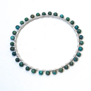 Silver bangle bracelet wrapped with turquoise gemstones