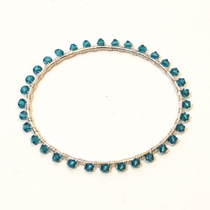 Silver bangle bracelet wrapped with turquoise Swarovski bicone crystal beads