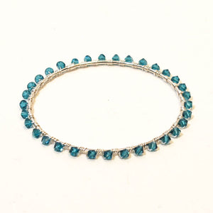 Silver bangle bracelet wrapped with turquoise Swarovski bicone crystal beads