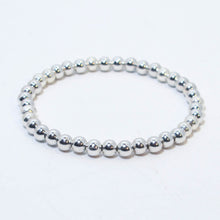 Load image into Gallery viewer, Silver Stretchy Bracelet with 6mm. Round Metal Beads