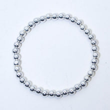 Load image into Gallery viewer, Silver Stretchy Bracelet with 6mm. Round Metal Beads