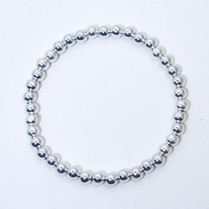 Silver Stretchy Bracelet with 6mm. Round Metal Beads