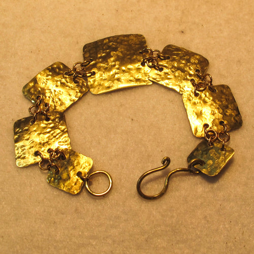 Brass Hand-Cut Metal Shapes Bracelet with hand-shaped wire hook clasp