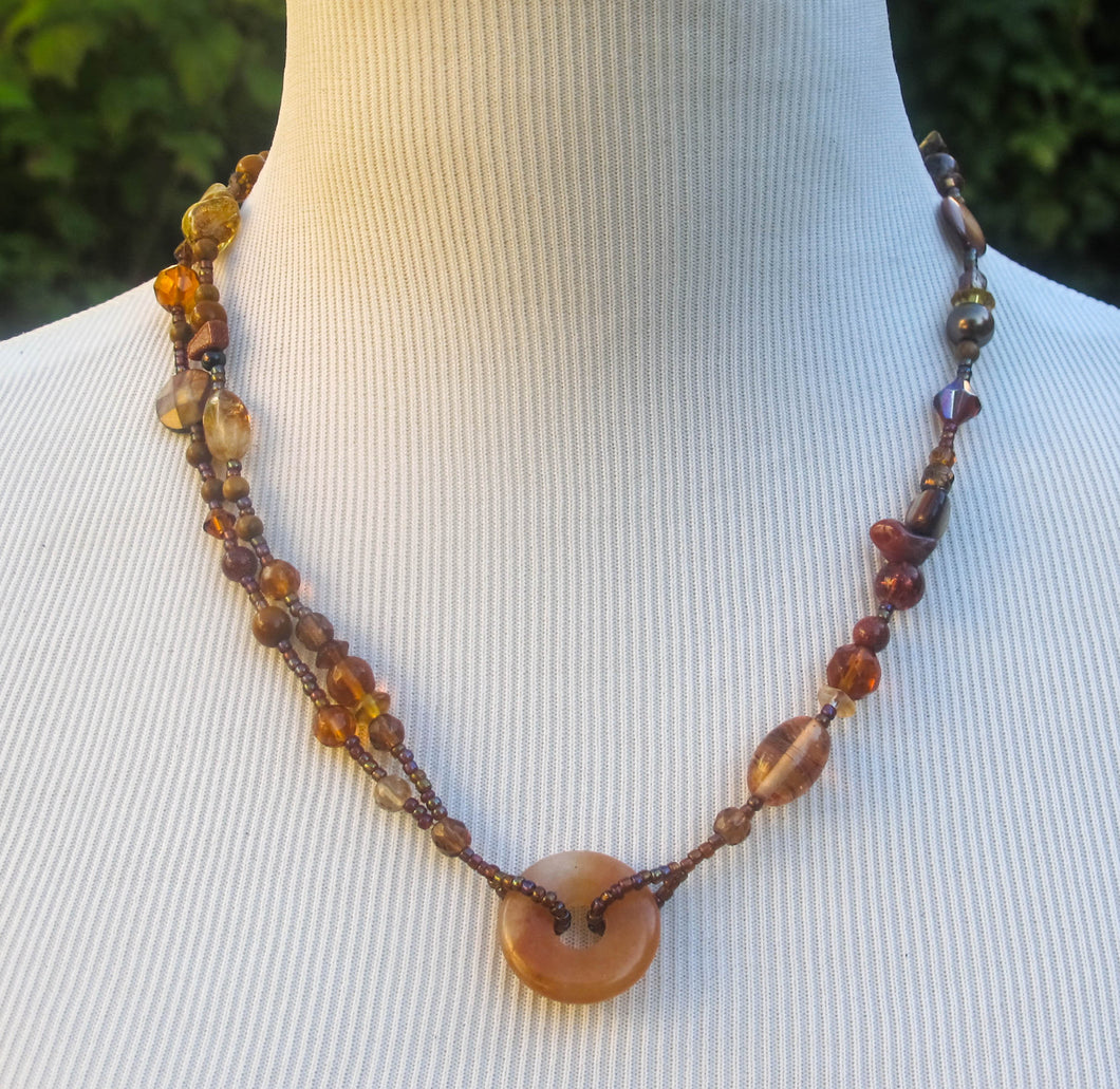 Multi-Strand Necklace with carnelian donut with gemstone and glass beads