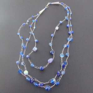 Products Multi-Strand, Crocheted Wire or Cord Necklace with Silver Cones and Blue Beads