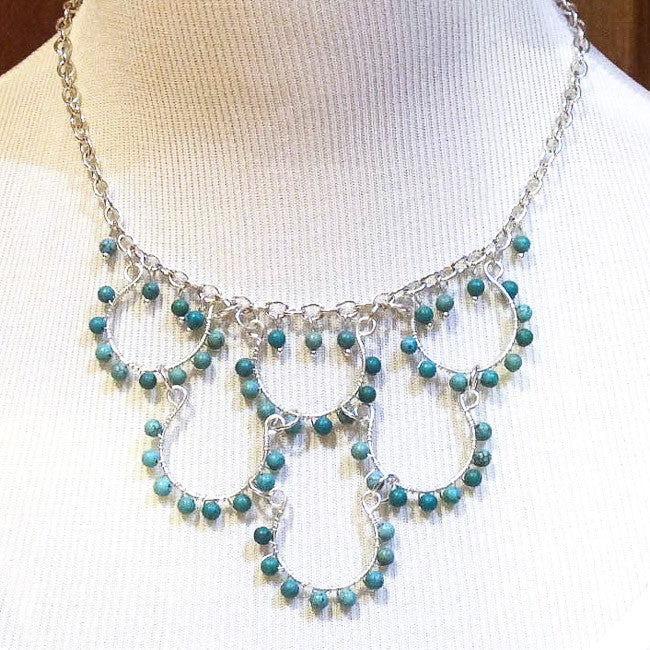 6-Loop Bead Necklace on silver chain wrapped with turquoise magnesite beads