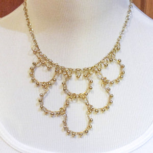 6-Loop Handmade Necklace wrapped with matching metal beads on gold chain