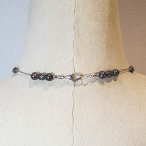 Floating Design Freshwater Pearl & Textured Metal Beads Necklace on gray silk cord with silver lobster claw clasp
