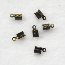 Load image into Gallery viewer, Antique Brass Foldover Crimps