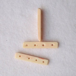 White bone spacers, 4-hole