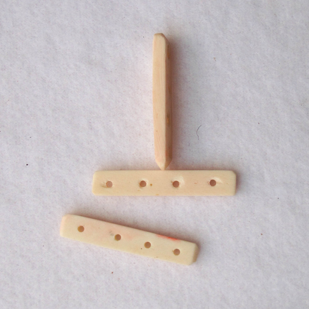 White bone spacers, 4-hole
