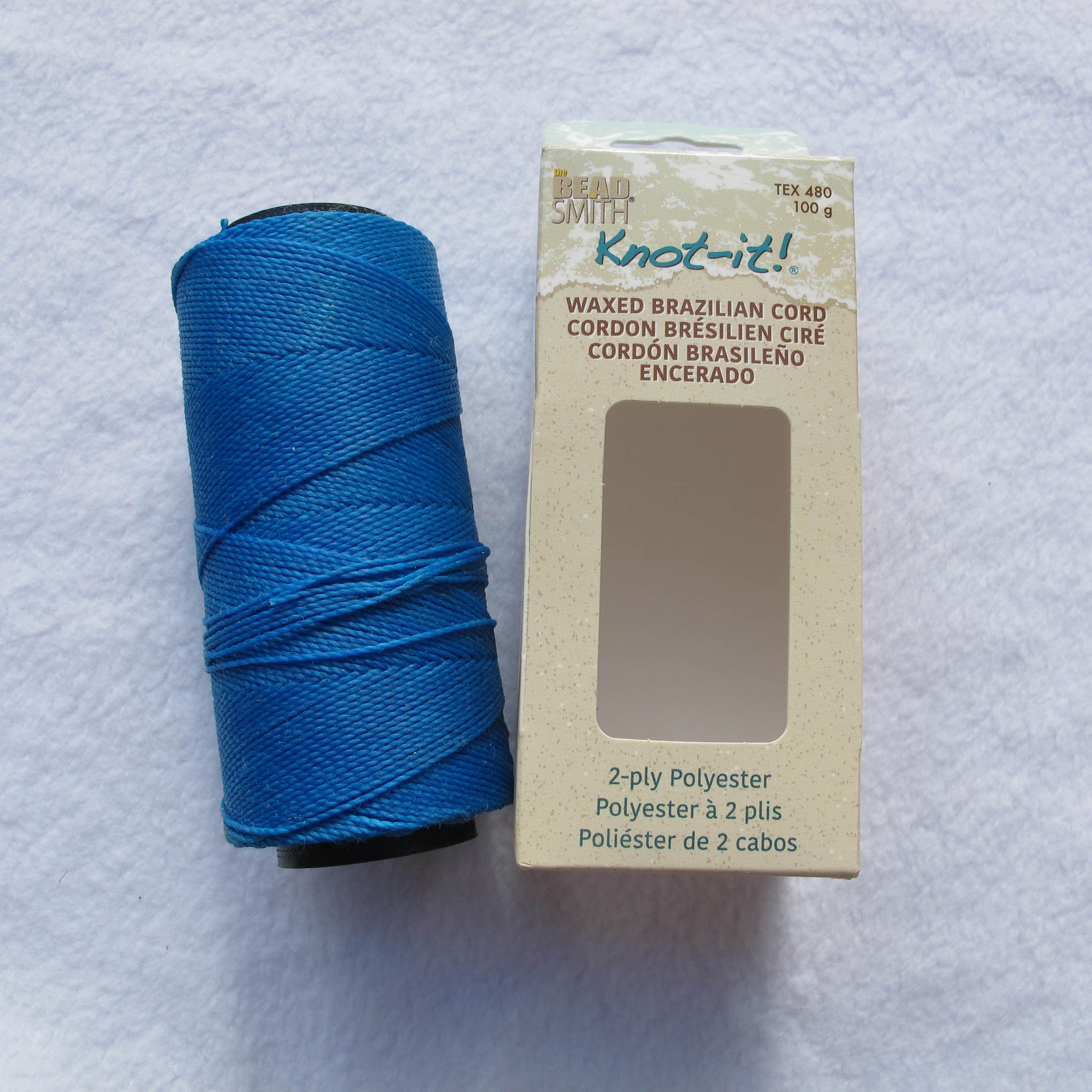 Cord, waxed cotton, turquoise blue, 2mm, 50+ pound test. Sold per 25-meter  spool. - Fire Mountain Gems and Beads